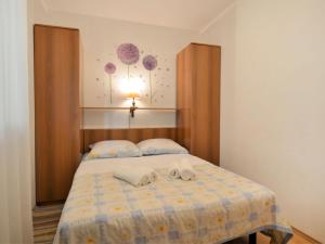 Posteľ alebo postele v izbe v ubytovaní Holiday Home Gloria by Interhome