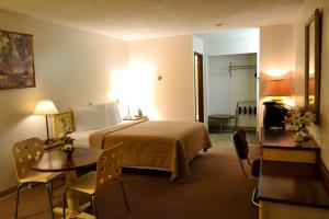 Voodi või voodid majutusasutuse Hoo-Doo Motel toas