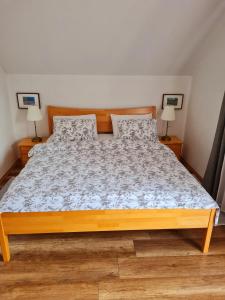 Postel nebo postele na pokoji v ubytování Apartman Poznanovic