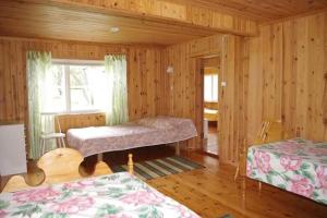 Postel nebo postele na pokoji v ubytování Sepa Jõe Holiday Home