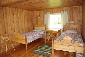 Postel nebo postele na pokoji v ubytování Sepa Jõe Holiday Home