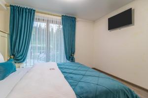 Postel nebo postele na pokoji v ubytování Guest House Turda + 37 fotografií