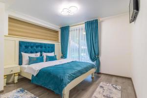 Postel nebo postele na pokoji v ubytování Guest House Turda