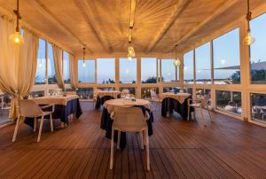 Reštaurácia alebo iné gastronomické zariadenie v ubytovaní Tuscany Hotel Alle Dune