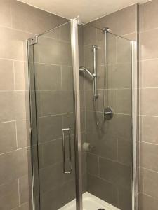 Koupelna v ubytování Appartements Domizil + 37 fotografií
