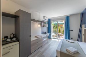 Kuchyňa alebo kuchynka v ubytovaní Tuscany Hotel Alle Dune