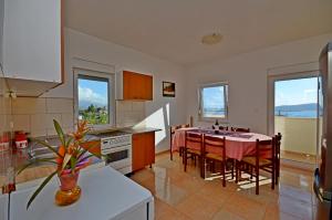 Η κουζίνα ή μικρή κουζίνα στο Apartments A&G