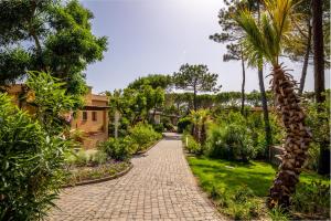 Vonkajšia záhrada v ubytovaní Tuscany Hotel Alle Dune