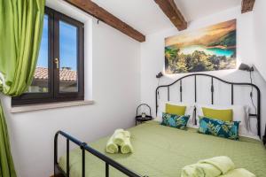 Postel nebo postele na pokoji v ubytování Villa LAVANTINA