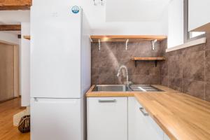 Kuchyň nebo kuchyňský kout v ubytování Villa LAVANTINA