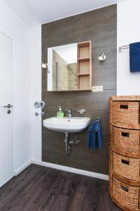 Koupelna v ubytování Ferienwohnung Haus Heimathafen + 33 fotografií