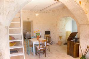 Posezení v ubytování Trullo Sweet Trullo