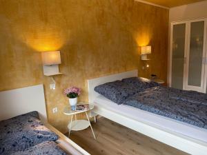 Postel nebo postele na pokoji v ubytování promedklinik apartment 1