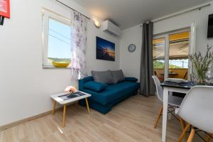 Posezení v ubytování Apartments and Rooms YASMIN