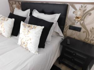 Cama o camas de una habitación en HOTEL TERRA GALEGA MEIGA