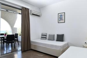 Postel nebo postele na pokoji v ubytování Phaistos Hotel