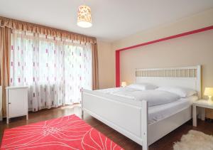 Postel nebo postele na pokoji v ubytování Dorf Residenz