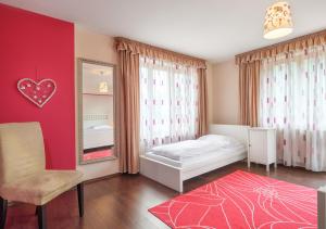 Postel nebo postele na pokoji v ubytování Dorf Residenz