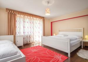 Postel nebo postele na pokoji v ubytování Dorf Residenz