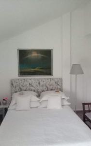 Ένα ή περισσότερα κρεβάτια σε δωμάτιο στο Villa 'O Sole Mio