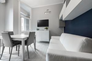 Televízia a/alebo spoločenská miestnosť v ubytovaní Casa da Suite Anima