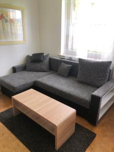 Ein Sitzbereich in der Unterkunft Aventur Studio 212 Am Rotharrsteig