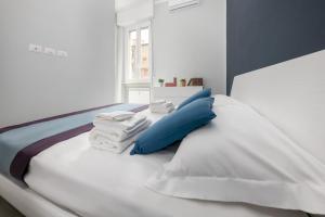 Postel nebo postele na pokoji v ubytování Casa da Suite Anima