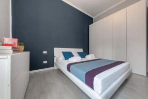Postel nebo postele na pokoji v ubytování Casa da Suite Anima