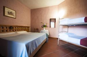Postel nebo postele na pokoji v ubytování Hotel Scintilla + 24 fotografií