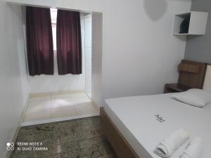 Postel nebo postele na pokoji v ubytování Hotel Belenzinho