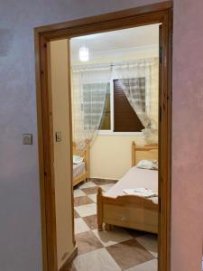 Postel nebo postele na pokoji v ubytování Appartement Mus saidia 1