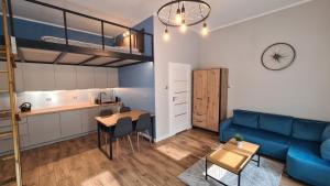 Køkken eller tekøkken på Antresola - Apartamenty Parkowe