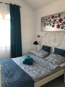 Posteľ alebo postele v izbe v ubytovaní Apartament J&P CostaCalma