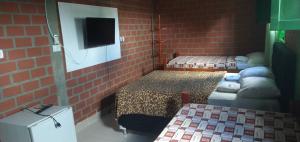Katil atau katil-katil dalam bilik di Pousada Monte Serrat