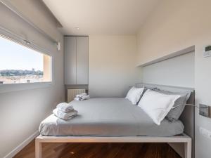 Posteľ alebo postele v izbe v ubytovaní Penthouse center