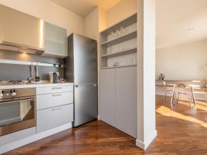 Kuchyňa alebo kuchynka v ubytovaní Penthouse center