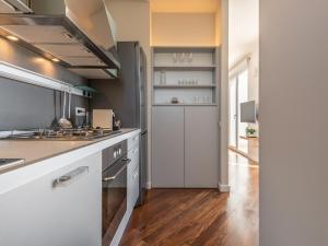 Kuchyňa alebo kuchynka v ubytovaní Penthouse center