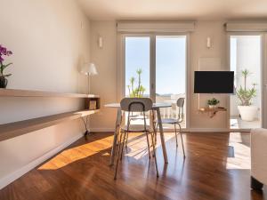 Televízia a/alebo spoločenská miestnosť v ubytovaní Penthouse center