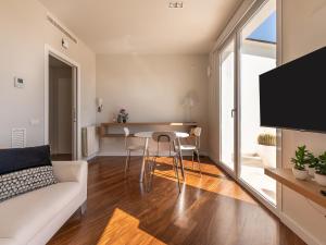 Televízia a/alebo spoločenská miestnosť v ubytovaní Penthouse center