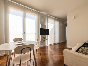 Televízia a/alebo spoločenská miestnosť v ubytovaní Penthouse center