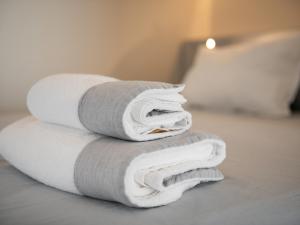 Posteľ alebo postele v izbe v ubytovaní Penthouse center