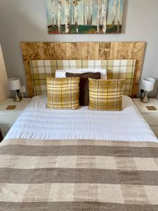 Tempat tidur dalam kamar di Number 19 Guest House - 4 miles from Barrow in Furness - 1 mile from Safari Zoo