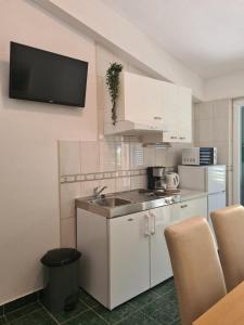 Kuchyňa alebo kuchynka v ubytovaní Apartments Marijan