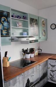 A kitchen or kitchenette at Stóri-Bakki Guesthouse-with hot tub