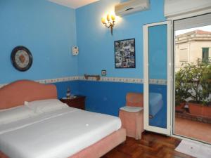 Posteľ alebo postele v izbe v ubytovaní Alle Terrazze del Borgo Vecchio