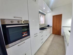 A kitchen or kitchenette at Alba Serena
