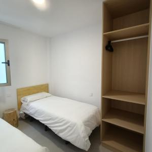 Posteľ alebo postele v izbe v ubytovaní La Puntilla Arena
