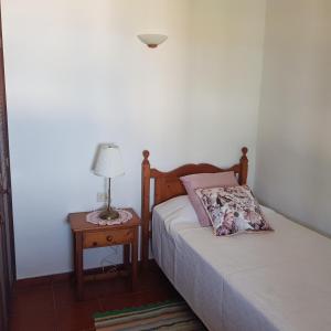 En eller flere senger på et rom på Casa Pardelo