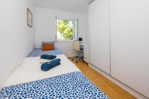 Posteľ alebo postele v izbe v ubytovaní Apartment Mario Star