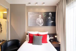 Cama o camas de una habitación en Hotel Zinema7